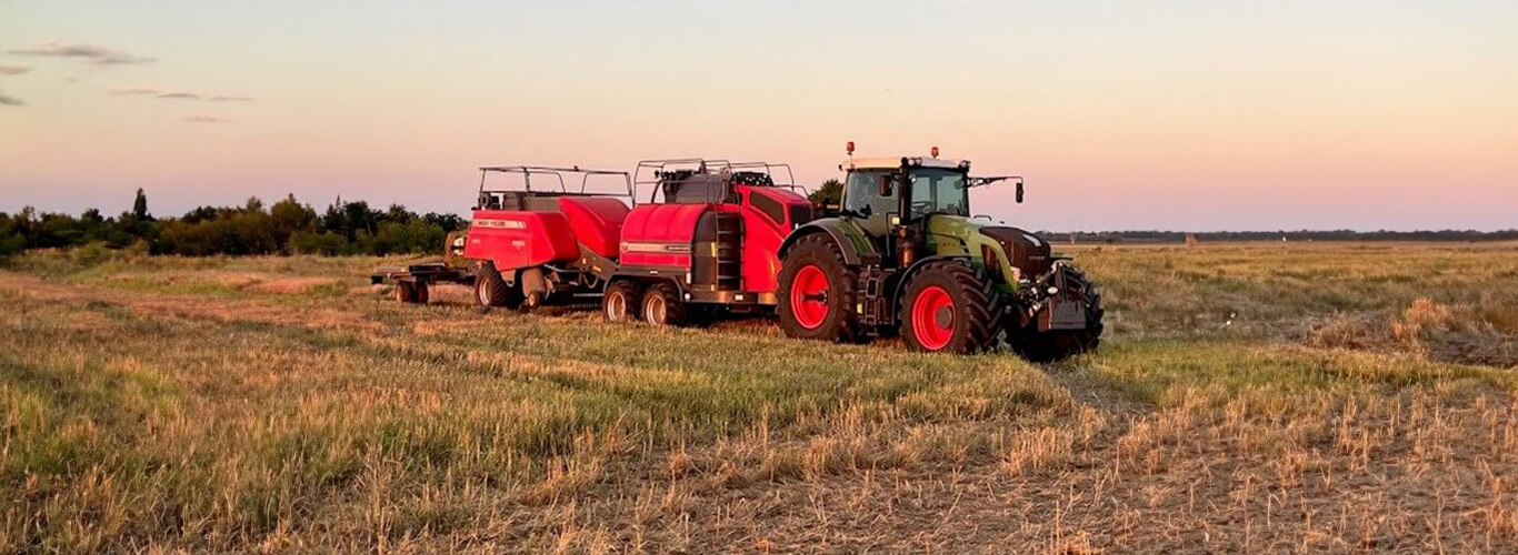 Fendt tractor pulling a steamer and baler.